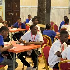 Workshop participants engage in hands-on activities at Distinct Minds Academy